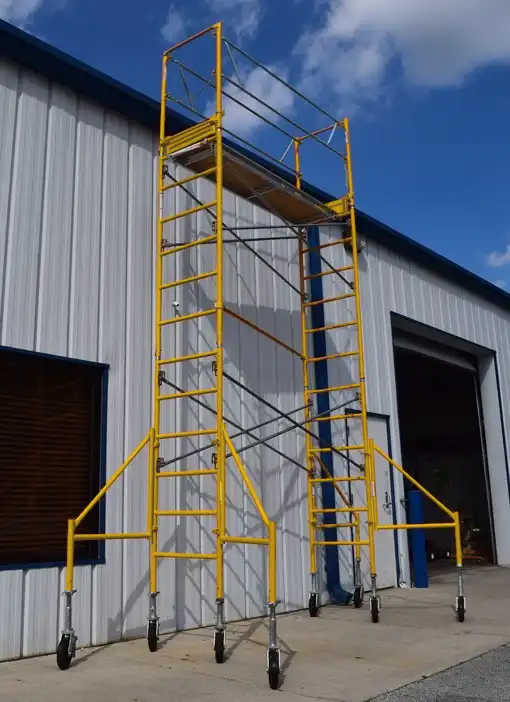 13 ft Deluxe Rolling Bakers Scaffold Tower next to a building